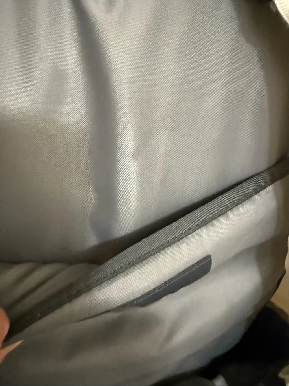 The North Face Two-Tone Beige and Black Backpack with Bungee Front